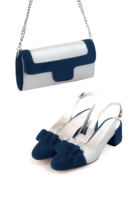 Women's silver and navy blue luxurious elegant clutch for ceremonies, weddings and evenings out. - Worn view